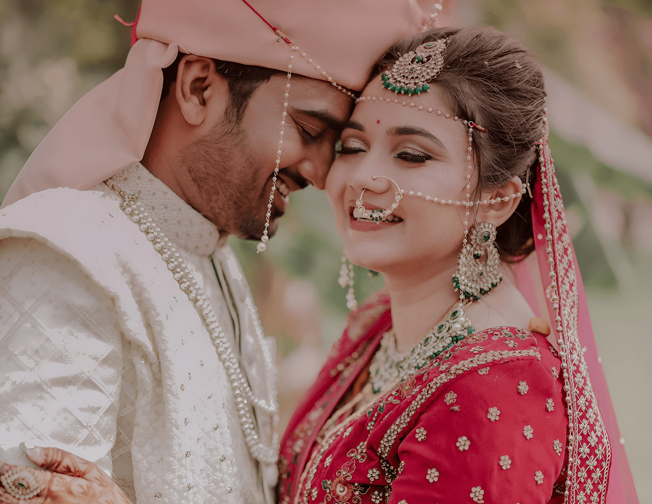 Happy couple in traditional wedding attire